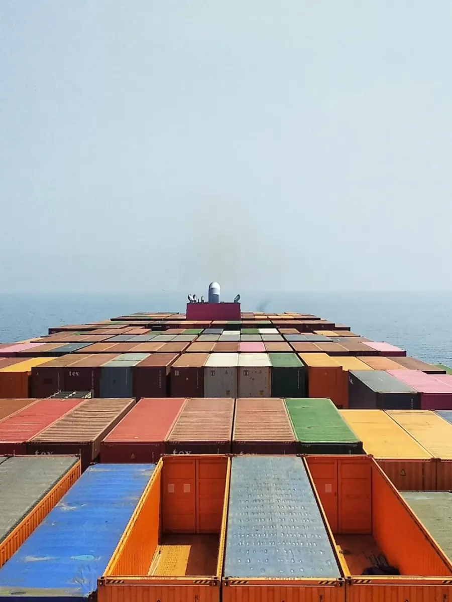 Container ship loaded with containers at sea