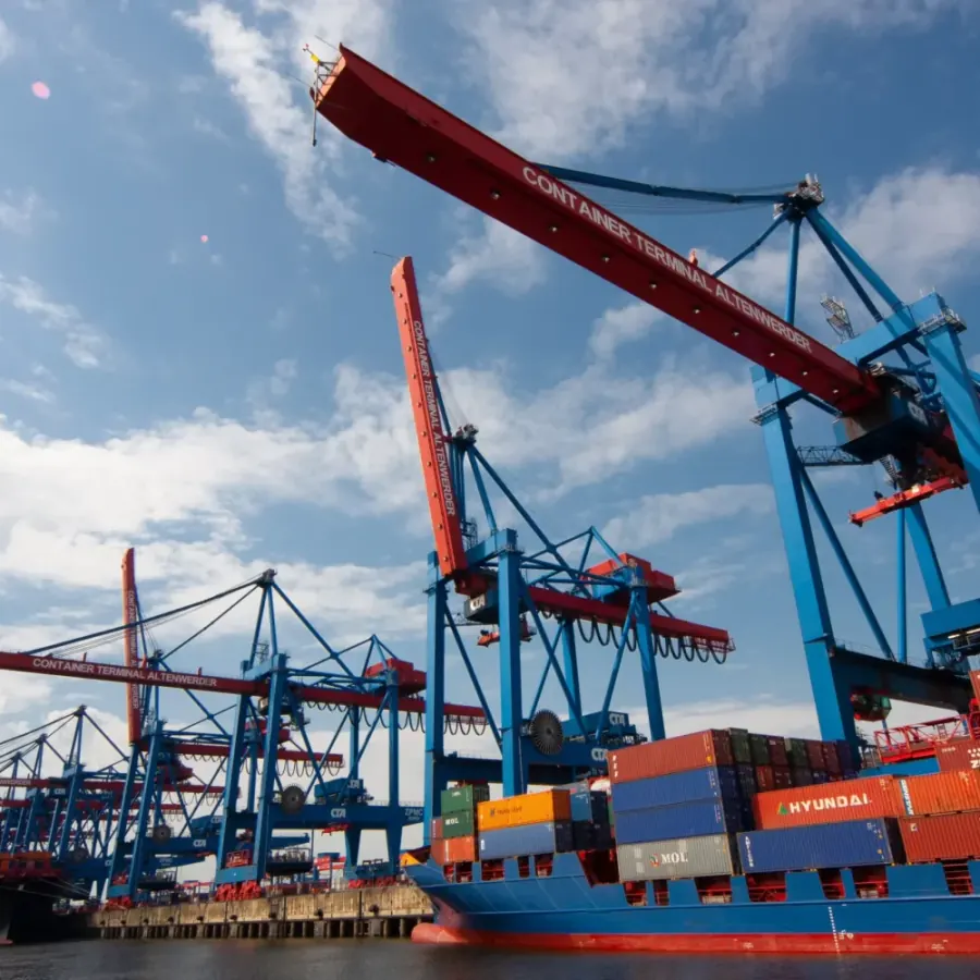 Container cranes loading a cargo ship